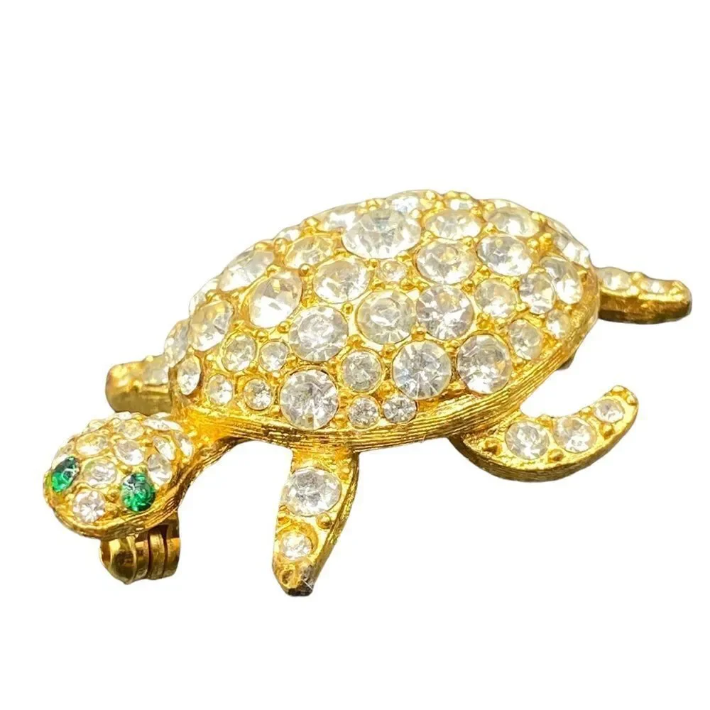 Gold tone rhinestone turtle tortoise pin brooch with green glass eyes gorgeous